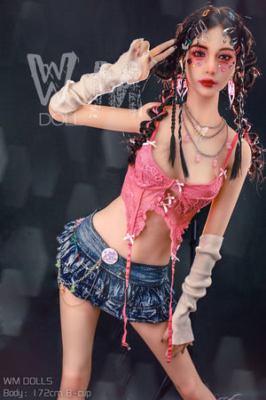 Love doll with pink top and denim skirt against a dark background